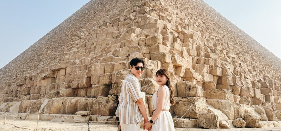 tourists at the pyramids of giza
