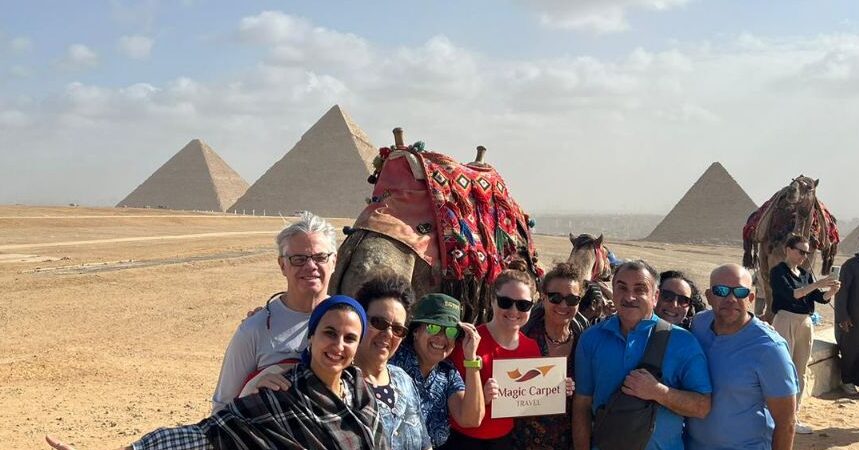 tourists at the pyramids of giza
